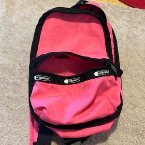 Beautiful hot pink lesportsac mini backpack in great condition